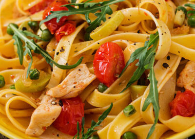 Fettuccine and Chicken in Tomato Cream Sauce
